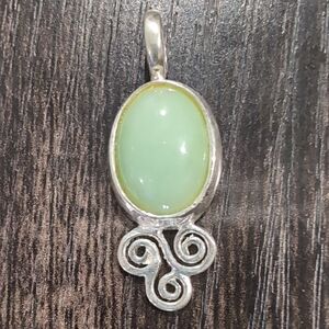 Artisan Silver Pendant with Pale Green Cabochon